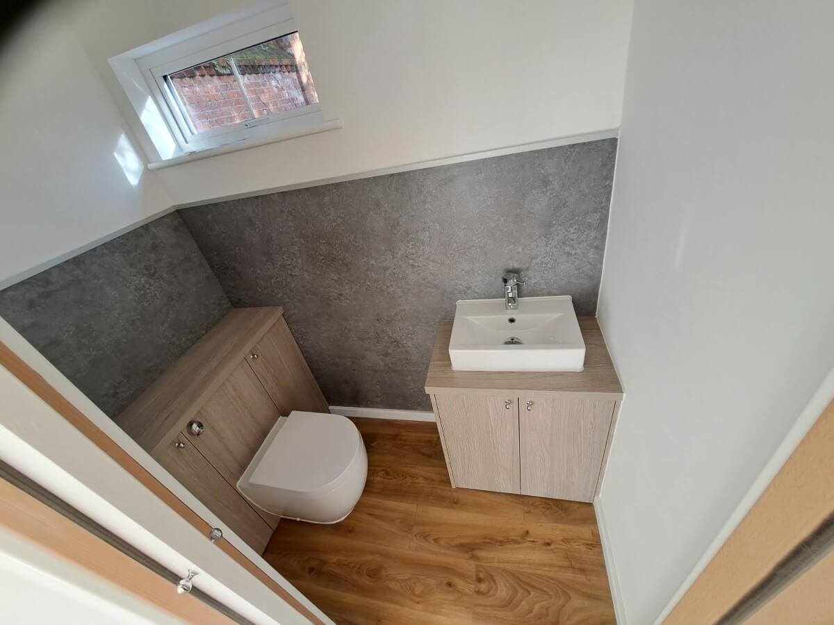 Bespoke garden Gym room with integrated toilet in Kingston, Surrey - internal toilet