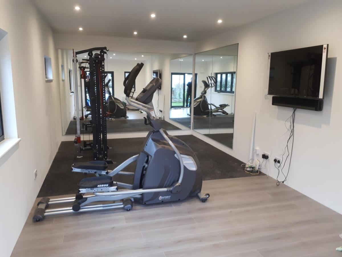 Bespoke garden Gym room with integrated toilet in Kingston, Surrey - internal view 2
