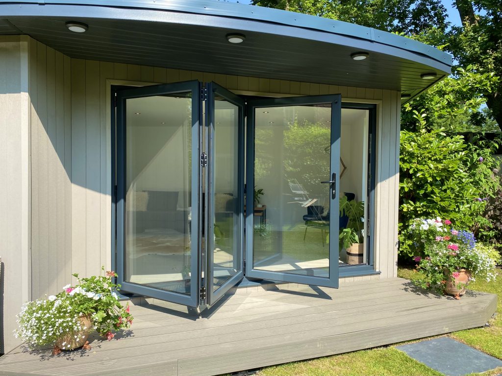 Premium bespoke garden room in Surrey, with bi-fold doors