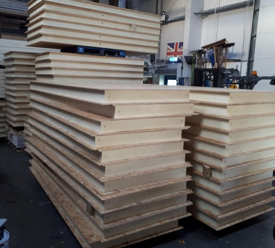 Stocks of Sips panels in warehouse - Garden Rooms by Drumbeat, Surrey